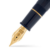 Close-up of Series 100 Commander nib in gold tone against navy lacquer section