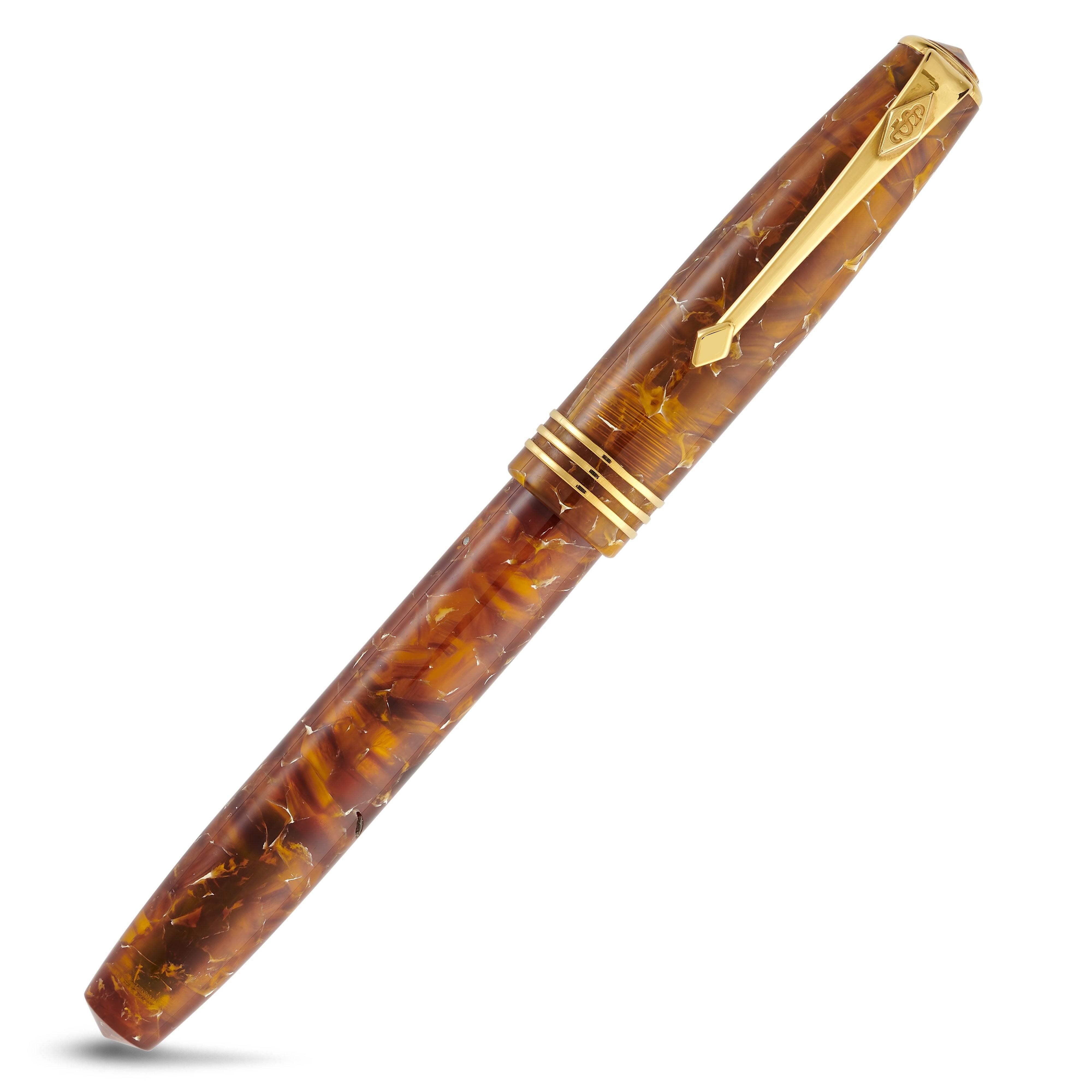 Capped Series 58 Amber fountain pen, reverse diagonal angle showing the faceted cap and clip