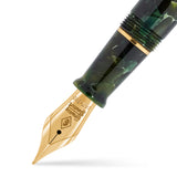 Close-up of the Series 58 Seamus Heaney gold nib beneath the green marbled cap and gold band