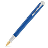 Capped Silvicity Royale Blue fountain pen at a similar diagonal angle, cap band and silver trim prominent