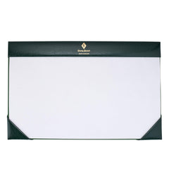 Green leather desk blotter half demy, overhead view of the blank blotting paper and gold branded corner