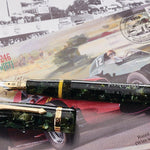 Vanwall Pen in green marbled acrylic, capped and cap detached, resting on illustrated 1958 Vanwall motor racing artwork