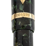Close-up of the gold cap band engraved with the edition number 001/270