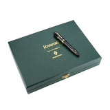 Vanwall fountain pen resting on its closed green presentation box embossed with gold lettering