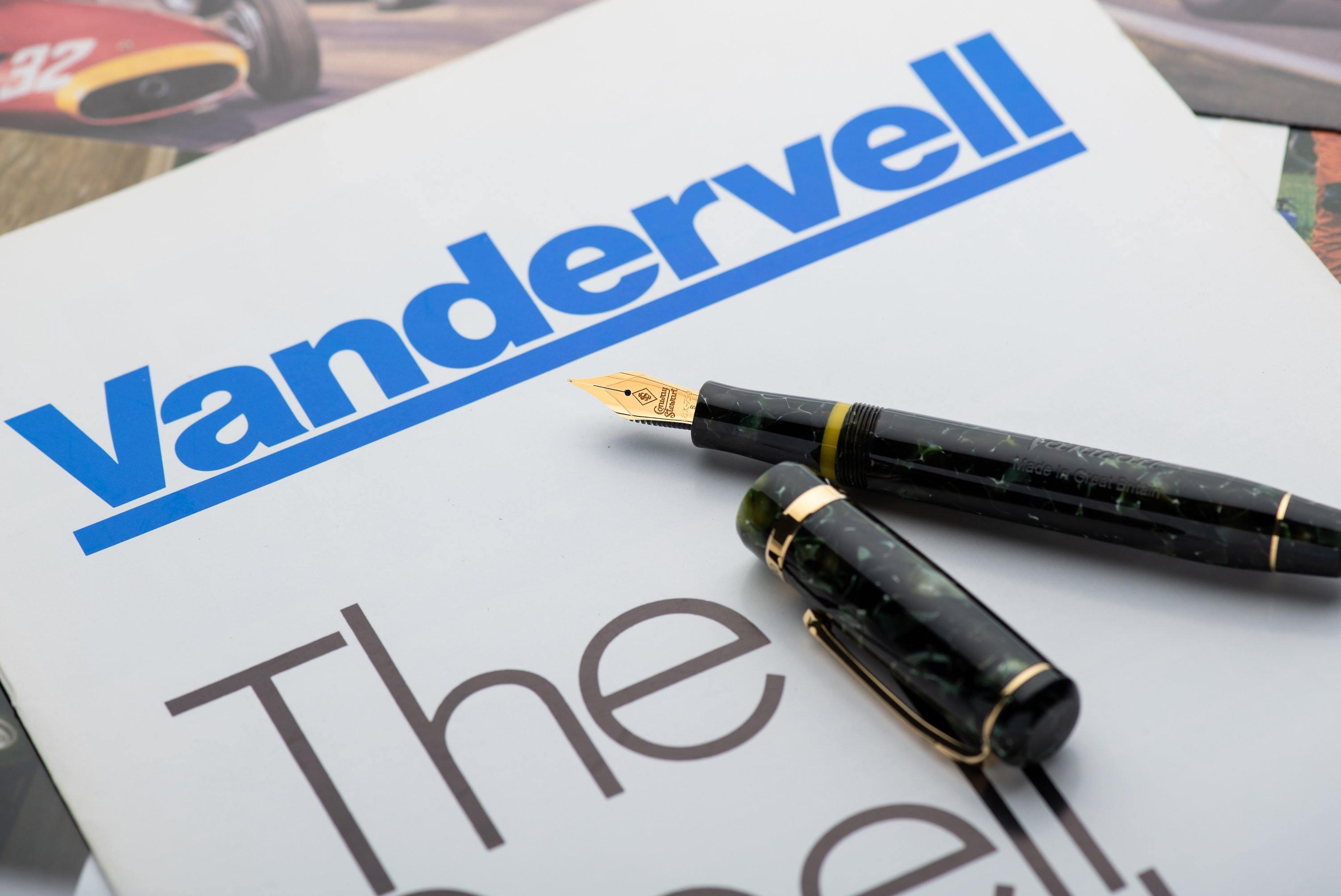 Vanwall fountain pen and cap resting on a Vandervell motor racing brochure