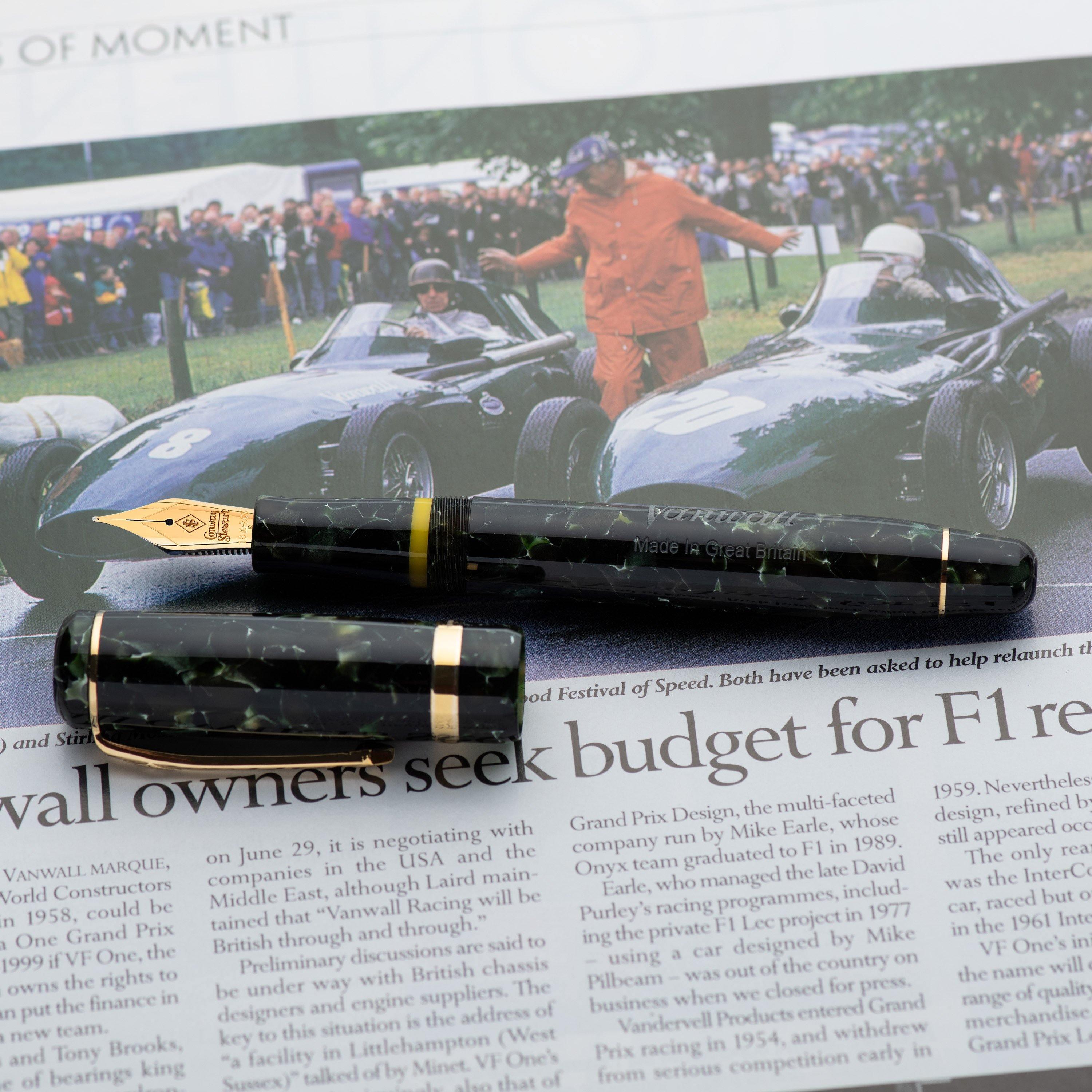 Vanwall fountain pen capped and uncapped on a newspaper article about Vanwall owners