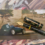Vanwall pen resting on a photograph of a green racing car, cap and barrel shown separately