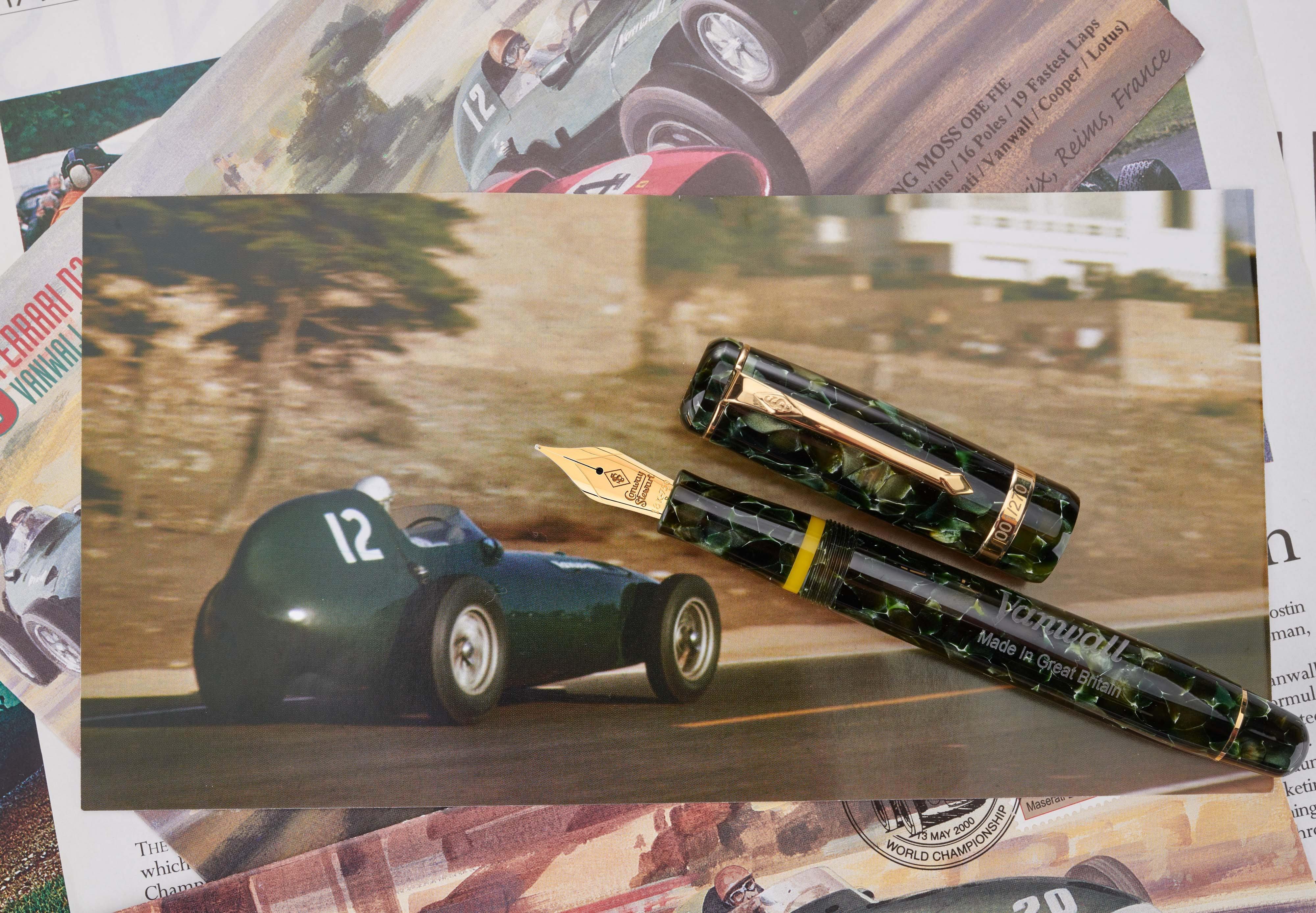Vanwall pen resting on a photograph of a green racing car, cap and barrel shown separately