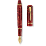 Schaft und Kappe des Winston Cherry Red nebeneinander liegend, Draufsicht auf das gesprenkelte Acrylfinish