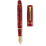 Schaft und Kappe des Winston Cherry Red nebeneinander liegend, Draufsicht auf das gesprenkelte Acrylfinish