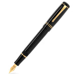 Winston Classic Black Gold fountain pen uncapped, glossy black lacquer with gold trim