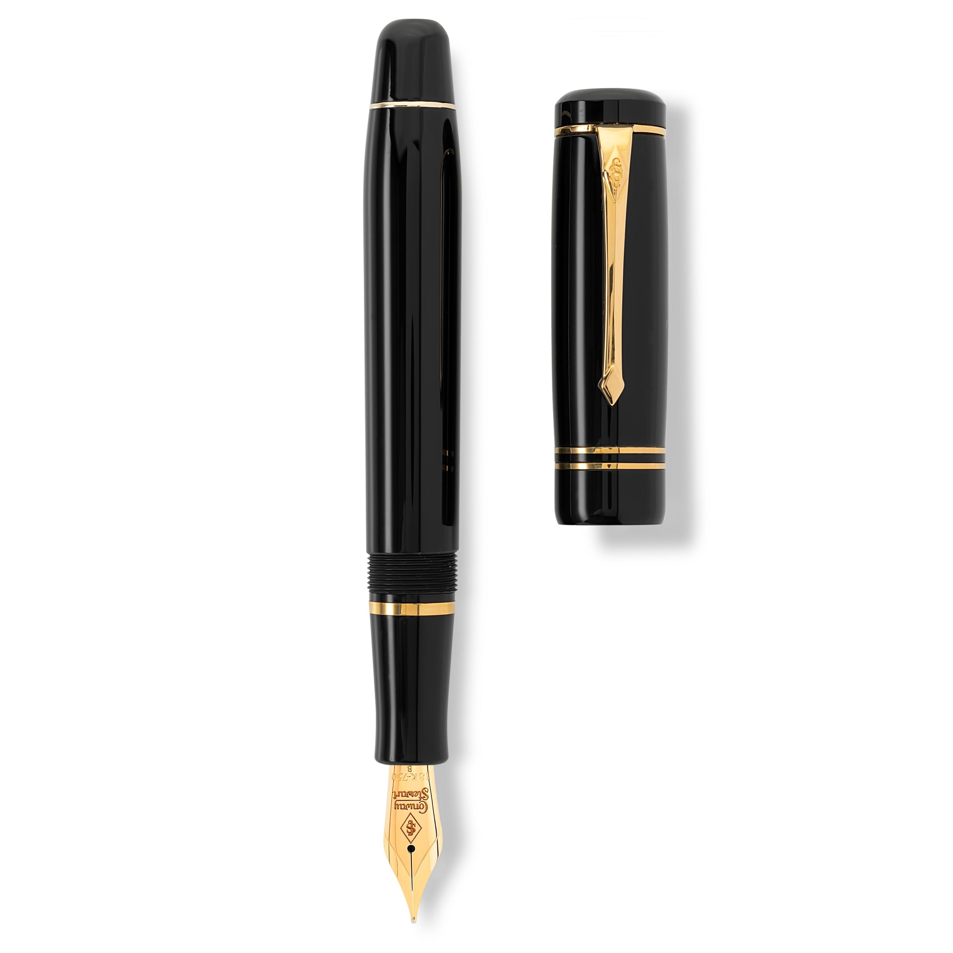 Winston Classic Black Gold fountain pen shown uncapped beside its cap, flat lay view
